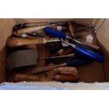 A box containing assorted woodworking tools including Marples wood turning chisels, various