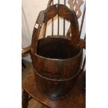 An old iron bound wooden yoke bucket