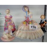 Four Royal Doulton figurines comprising Daydreams, The Little Bridesmaid HN 1433, Robin, and Tiny