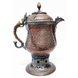 A large Persian samovar with chain handle and ornate coppered and chased finish