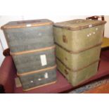 Two vintage bentwood and iron bound travelling trunks, one with green canvas weather coating, the