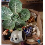A box containing assorted ceramics including Torquay pottery salt pig, Kathleen Fisher pheasant