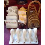 Four toast racks including Carlton Ware legs pattern
