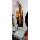 A French style painted wood cheval mirror with slender oval plate and drawer to platform base, set