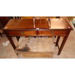 A 3' 6" reproduction mahogany, cross banded and strung Chippendale style hall table with two