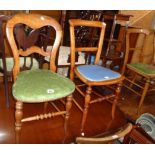 Four assorted Victorian and later bedroom chairs, all with upholstered seats and turned supports -