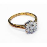 An import marked 375 gold diamond cluster ring