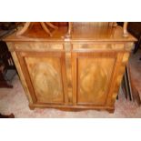 A 3' 7 1/2" mahogany and mixed wood chiffonier with two secret frieze drawers and pair of oval