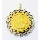 A 1910 gold sovereign loose mounted in a marked 375 pierced pendant mount