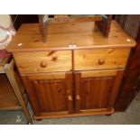 A 31 1/2" modern polished pine side cabinet with two short drawers and pair of panelled cupboard