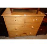 A 36" Victorian waxed pine chest of two short and two long graduated drawers - two handles detached,