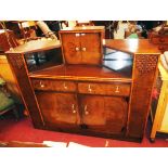 A 4' 6" vintage walnut veneered sideboard/drinks cabinet with central fitted cupboard and canted