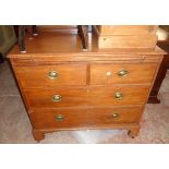 A 3' 1" 19th Century mahogany bachelor's chest with brushing slide, two short and two long graduated