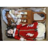 Three large modern porcelain dolls - sold with a dolls dressing table and stool