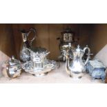 A quantity of silver plated items including a spirit percolator, cake basket, bottle coaster and