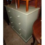 A 3' 1" modern painted pine chest of two short and three long drawers, set on plinth base