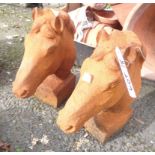 A pair of iron horse heads