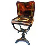 A 19" Regency flame mahogany quarter veneered work table with fitted interior, set on open