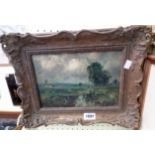 An ornate gilt framed oil on panel, depicting a rural landscape with wooden bridge and waterway in