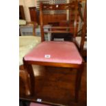 A set of four reproduction mahogany framed Regency style dining chairs with old rose velour