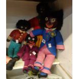 Four vintage Golly dolls in dapper outfits