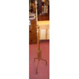 A late Victorian brass telescopic oil lamp standard with twist column and tripod base - converted to