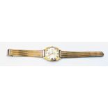 A vintage Lings 21 Prix gold plated day/date wristwatch with Swiss movement, on a marked CT 18/750