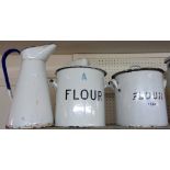 Two enamel flour bins and a jug