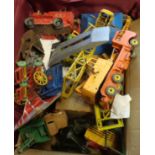 A suitcase containing assorted die cast toys - various condition