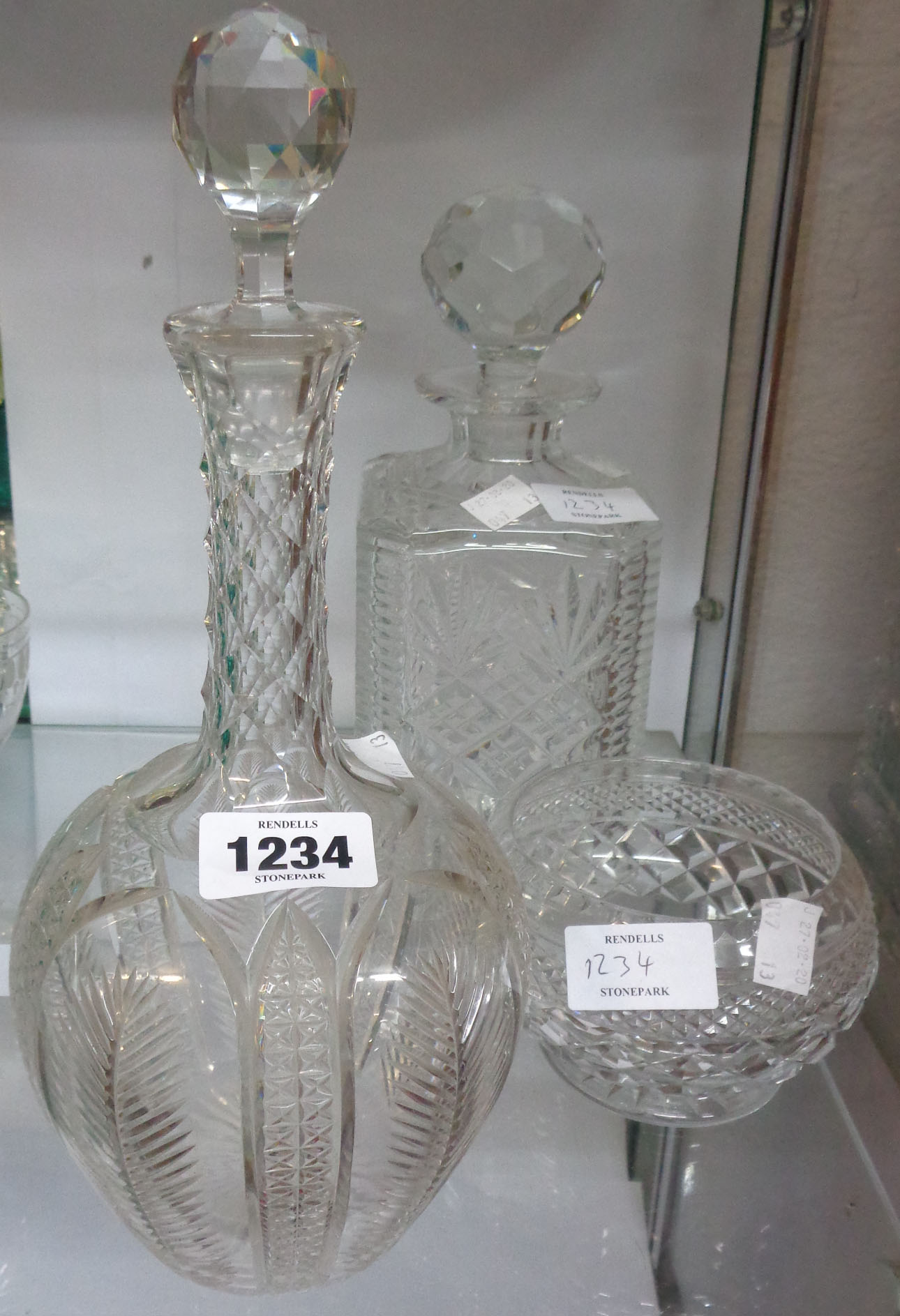 Two decanters and a glass bowl