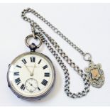 An antique Chester silver cased back wind pocket watch, on silver chain with silver fob - interior