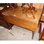 A 36" 19th Century mahogany Pembroke table with drawer to one end, set on turned legs