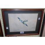 K. E. Wilcoxon: a framed watercolour depicting a Spitfire in flight - signed and dated '85 - the