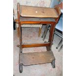A pair of Victorian stained pine prie dieu desk/kneelers in the Gothic style with shaped and