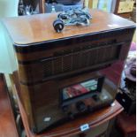 A vintage wooden cased HMV radio Model 491