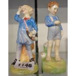 Two Royal Doulton figurines; LIttle Boy Blue HN 2062 and She Loves Me Not HN 2045