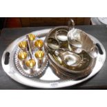 A silver plated tray, egg cruet, two gravy boats, etc.