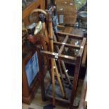 Various walking sticks and a Resto shooting stick - sold with a 20th Century stained oak stick