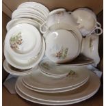 A large quantity of Grindley Hunting pattern dinner ware including soup bowls and saucers, meat