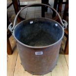 A large copper swing handle coal basket, riveted