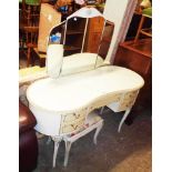 A 4' 5" French style painted wood kidney shaped dressing table with triple mirror, central blind