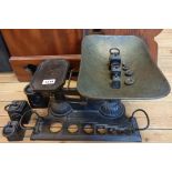 A set of late 19th Century cast iron weighing scales and weights