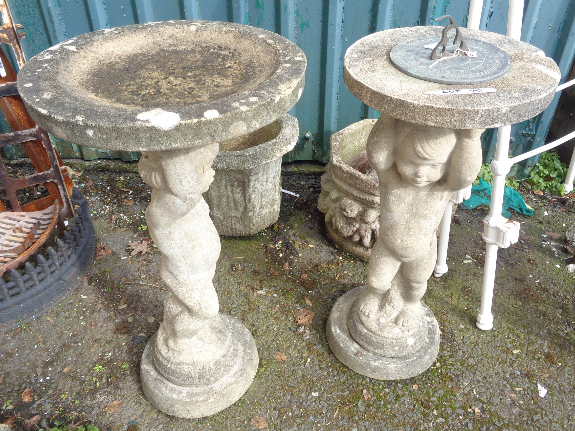 A concrete bird bath - sold with a sundial