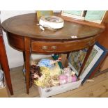 A 36" Edwardian mahogany and strung writing table with oval leather inset top and frieze drawer, set