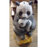 A 1980`s painted fibre glass World Wildlife Fund panda pattern collection box