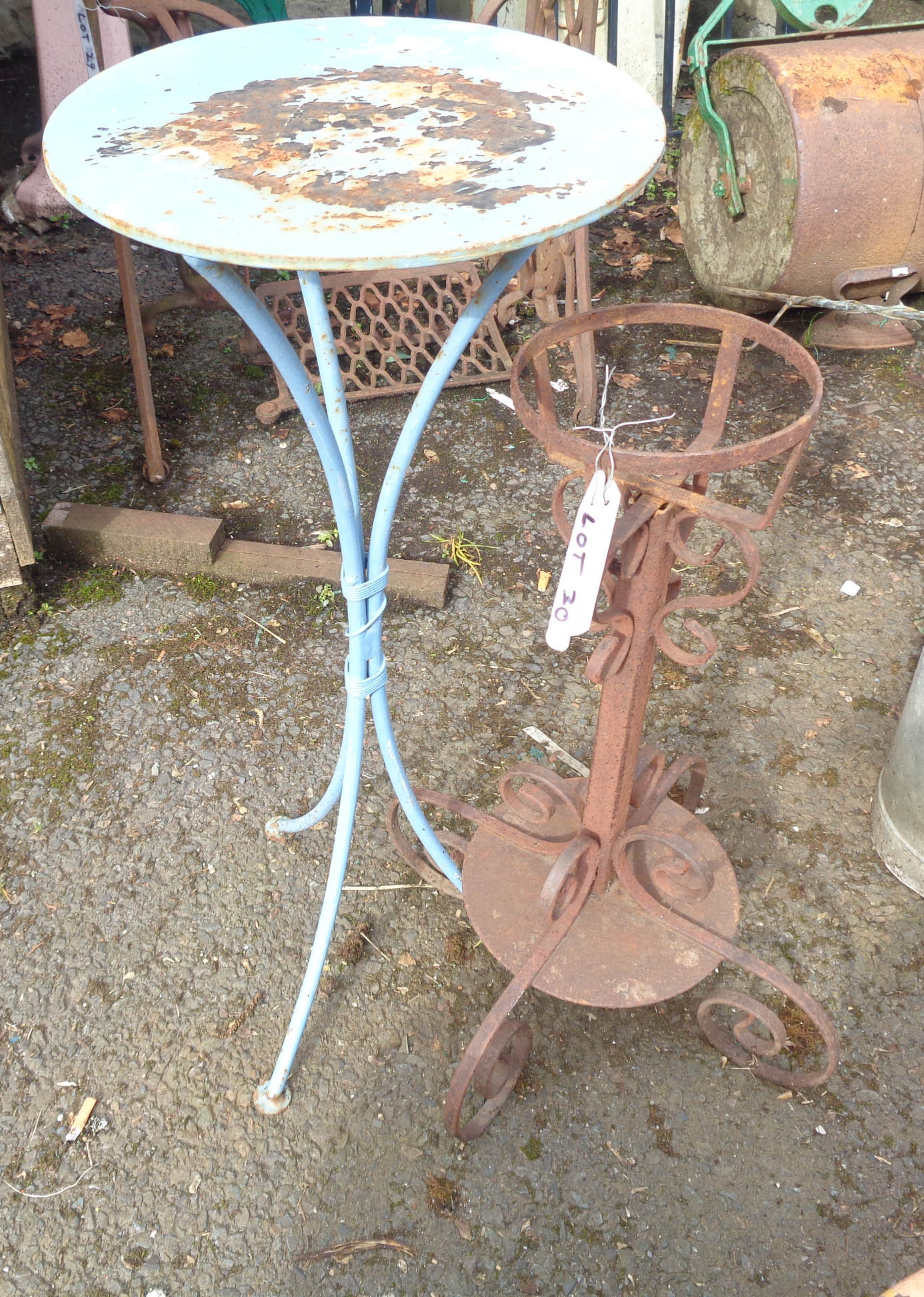 Two wrought metal garden stands