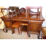 A 6' 6" 19th Century inlaid mahogany twin pedestal break front sideboard with ornate shell and