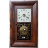 A 19th Century American mahogany veneered cased wall clock with decorative glazed door panel and New