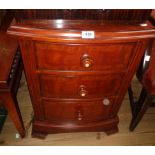 A 20" Frank Hudson reproduction mahogany bow front bedside chest of three long graduated drawers,
