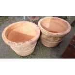 A pair of large terracotta garden pots